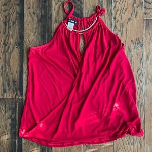 Size XL (definitely fits like Large) dressy “go out” tank.  See below